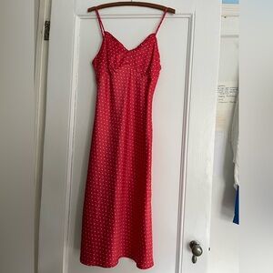 Red and white polka dot midi dress with a leg slit!